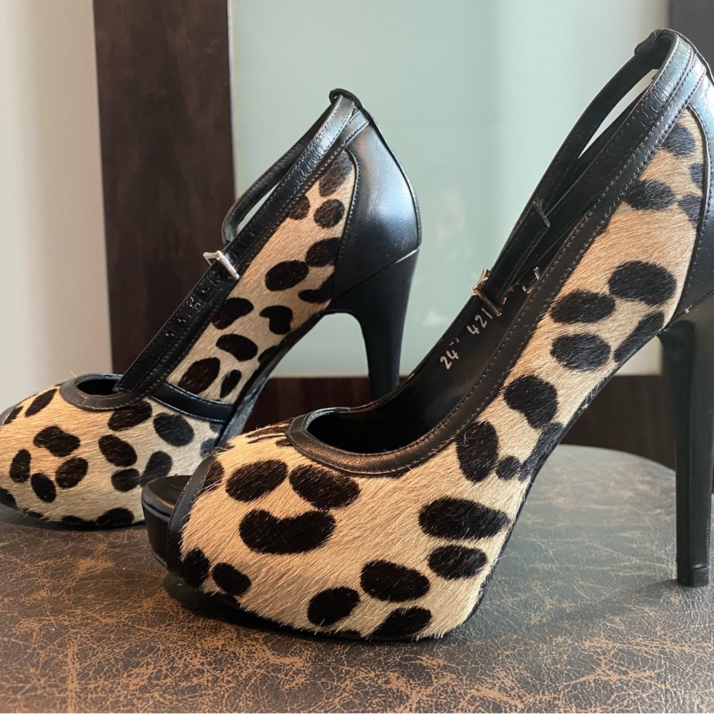 Felipe Rivera leopard print heels